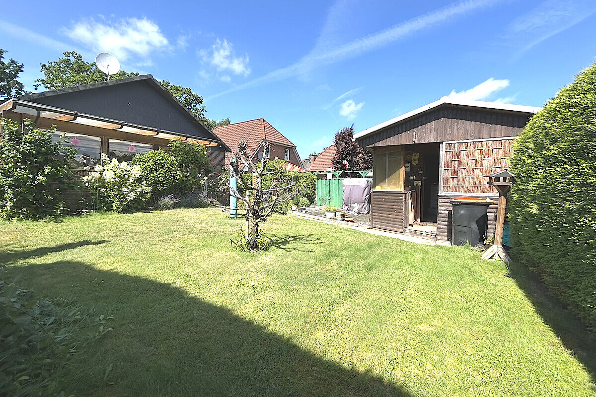 Haus Kauf 24623 Großenaspe sonnniger Garten mit Werkstatt
