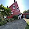 Haus Kauf 24536 Neumünster (Tungendorf) Seitenansicht mit Garage