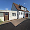 Haus Kauf 24536 Neumünster (Einfeld) Seitenansicht mit Anbau