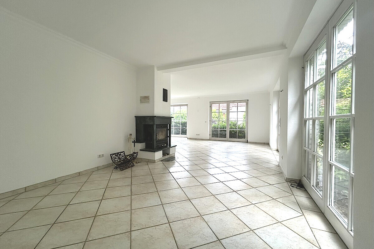Haus Kauf 24628 Hartenholm Wohnbereich mit Kamin